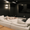 complete home theater during basement finishing project with soft lighting by pro worx construction in utah