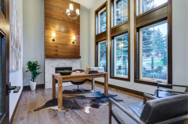 home office with large fireplace and large windows home office with large fireplace and large windows