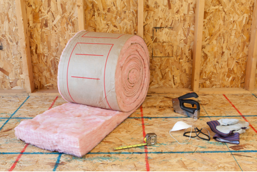 roll of insulation waiting to be installed in basement