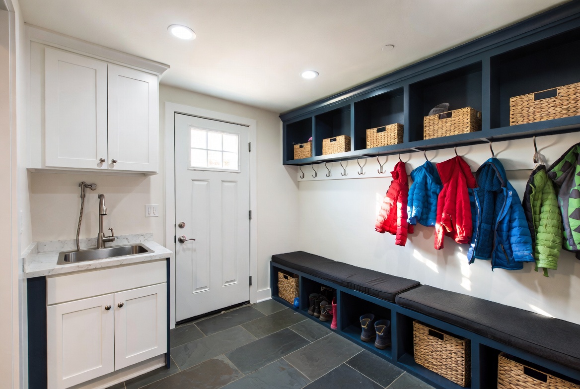 u-shaped-basement-mudroom-navy-cabinets-utility-sink-utah
