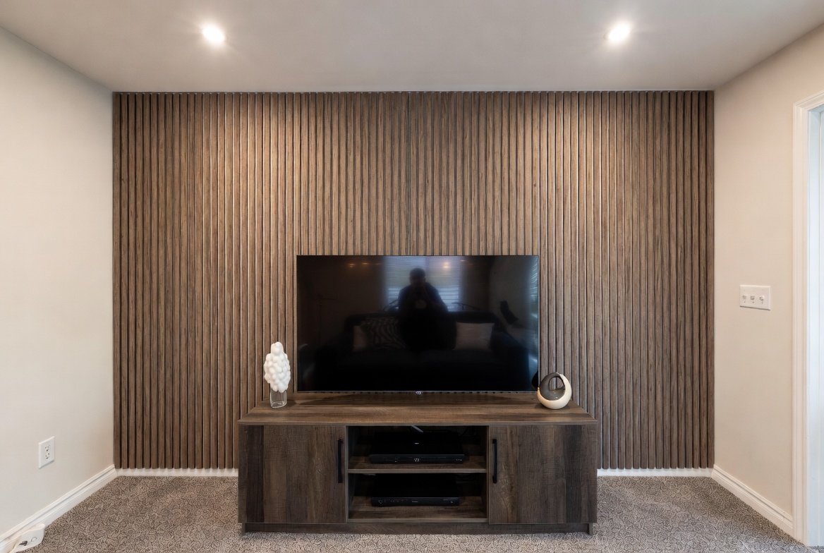 Wood slat accent wall behind TV